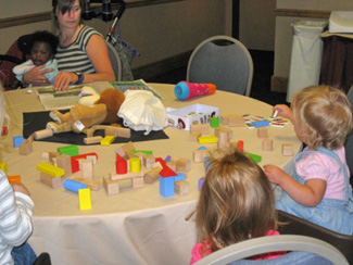 Children having fun with babysitter